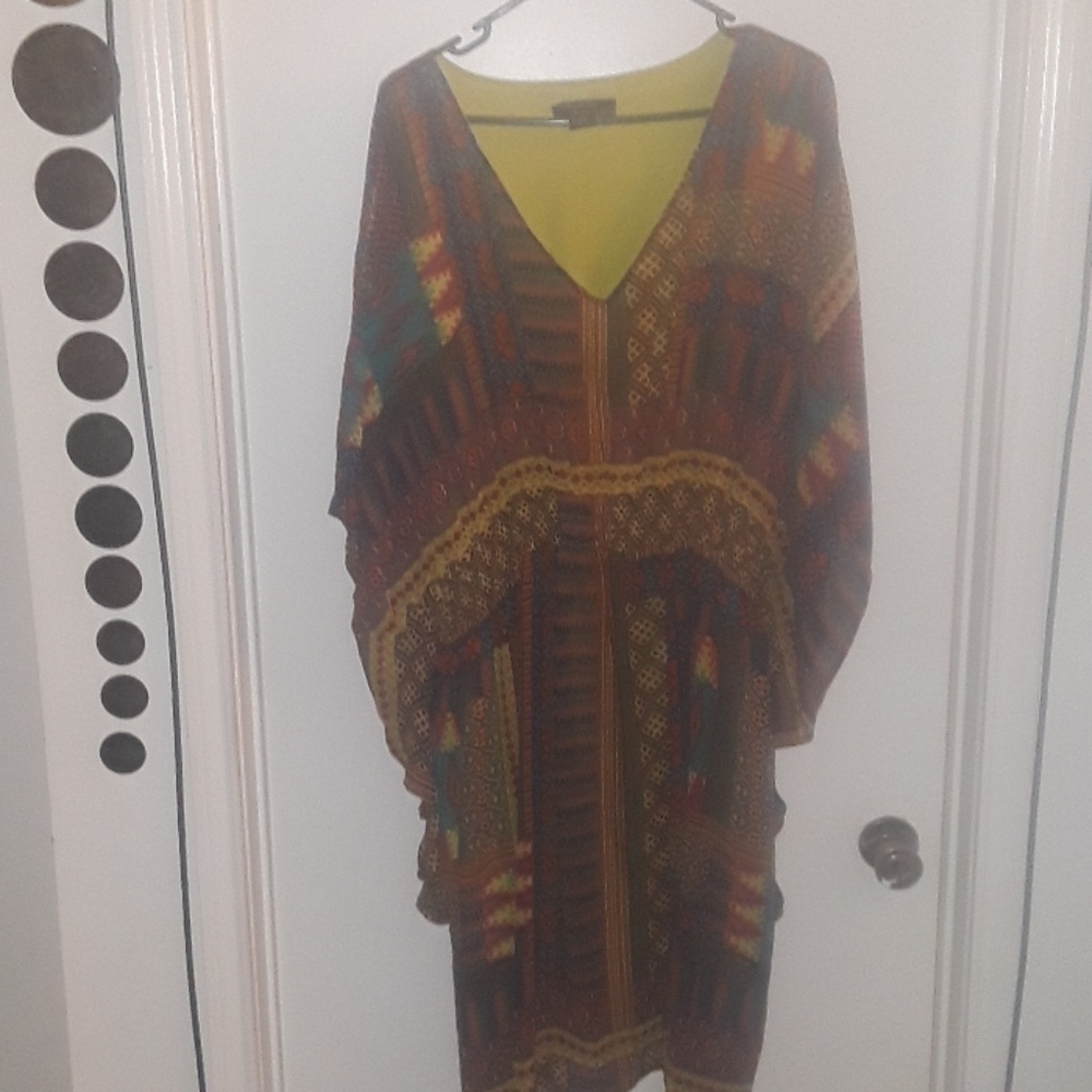 Sheer tribal print over lime green dress